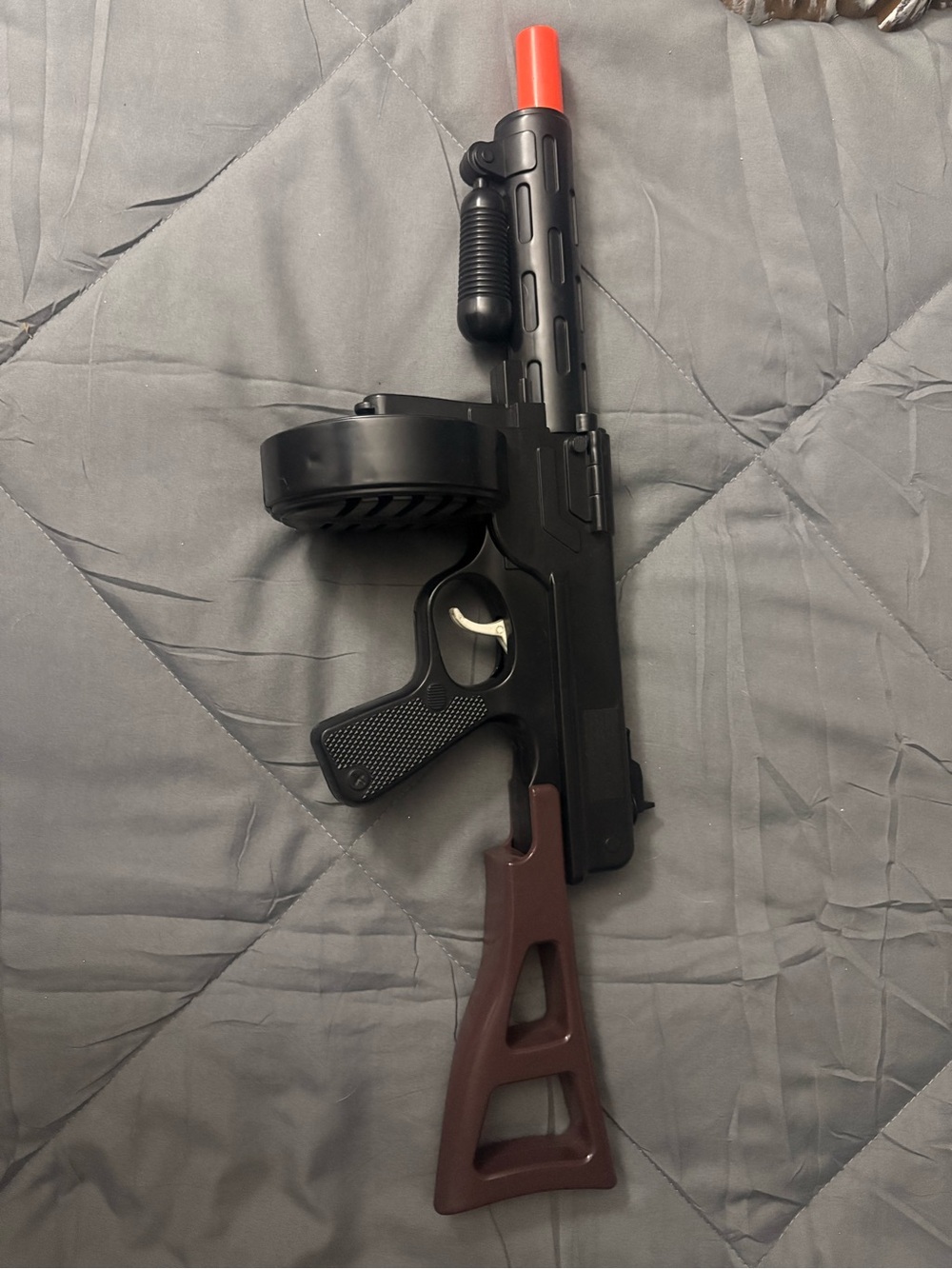 Black and Brown Toy Drum Magazine Rifle with Orange Tip